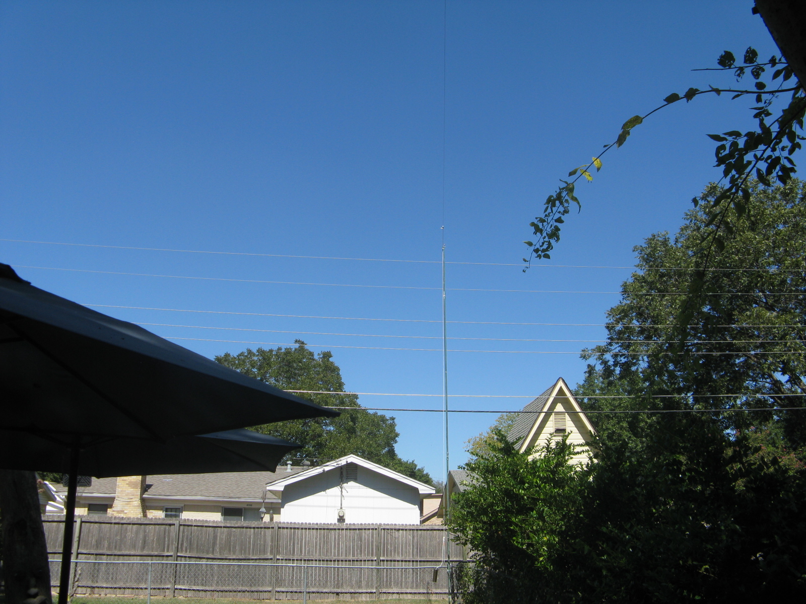 Antenna pole at back of yard